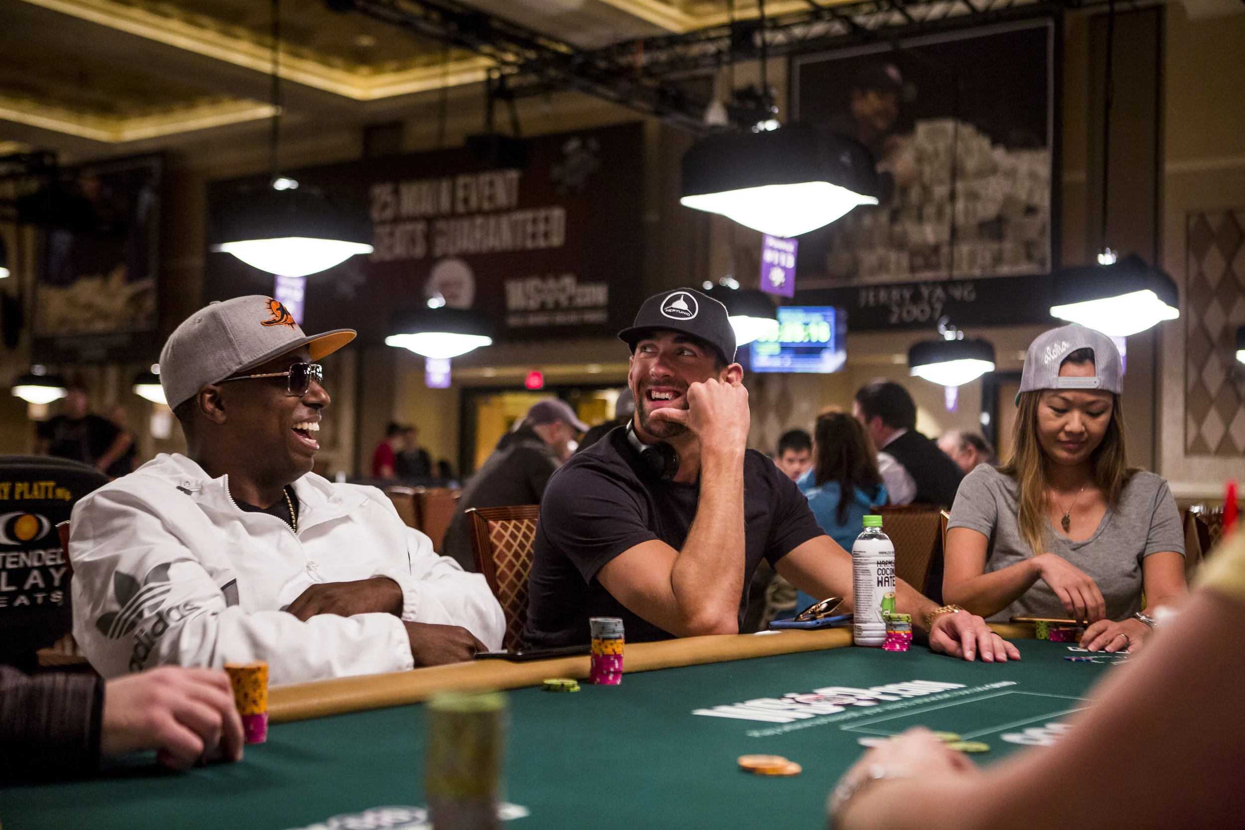 Olympic swimmer Michael Phelps shares a moment with poker star Maurice Hawkins during a tag team event in the opening of the World Series of Poker at the Rio Convention Center on Wednesday, May 31, 2017. Patrick Connolly Las Vegas Review-Journal @PConnPie