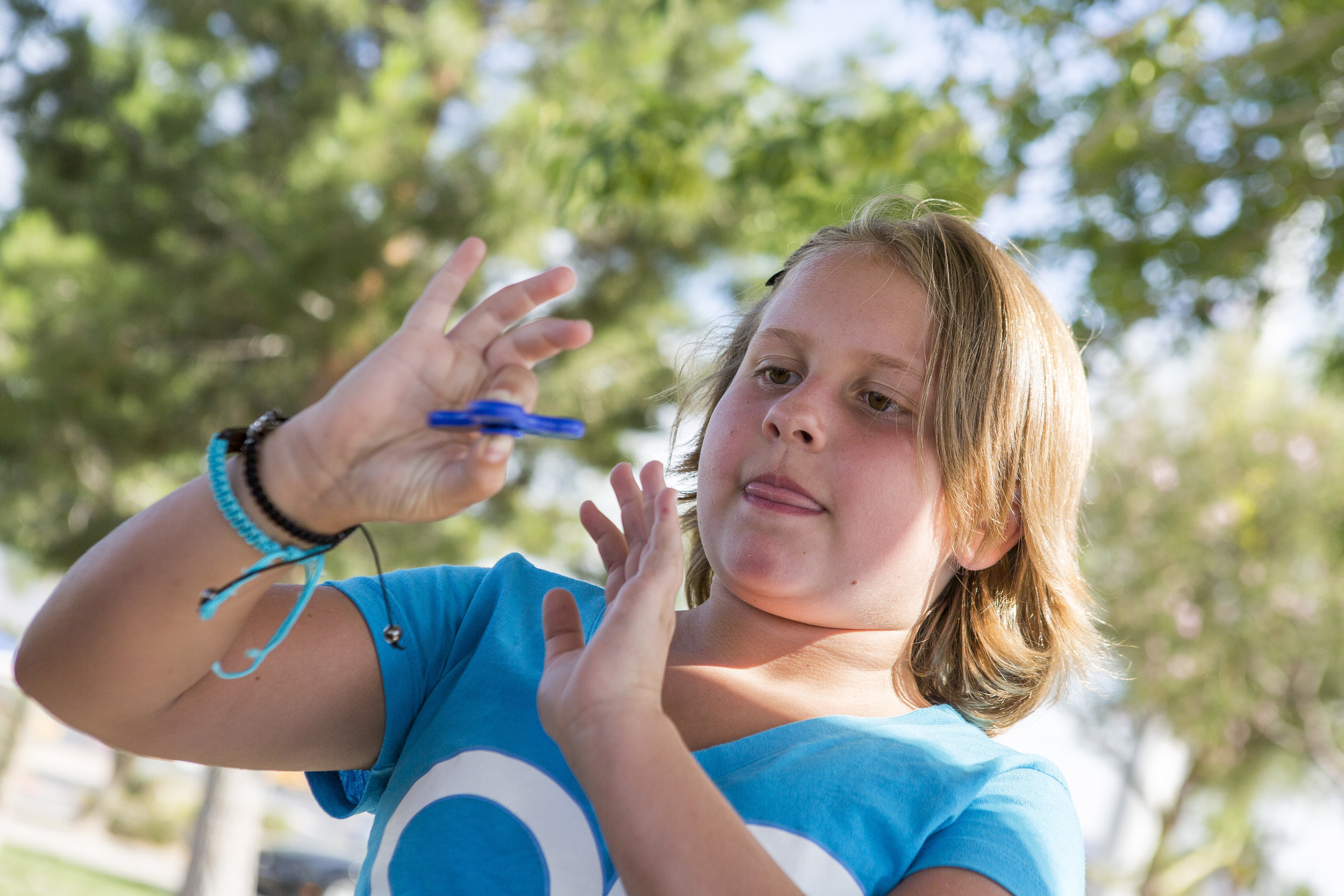  Tayler Rexroad, 8, plays with her fidget spinner at Stephanie Lynn Craig Park in Henderson on Monday, May 22, 2017. Fidget spinners have been the source of scrutiny by some school teachers and officials, some of whom have banned the toys. Patrick Co