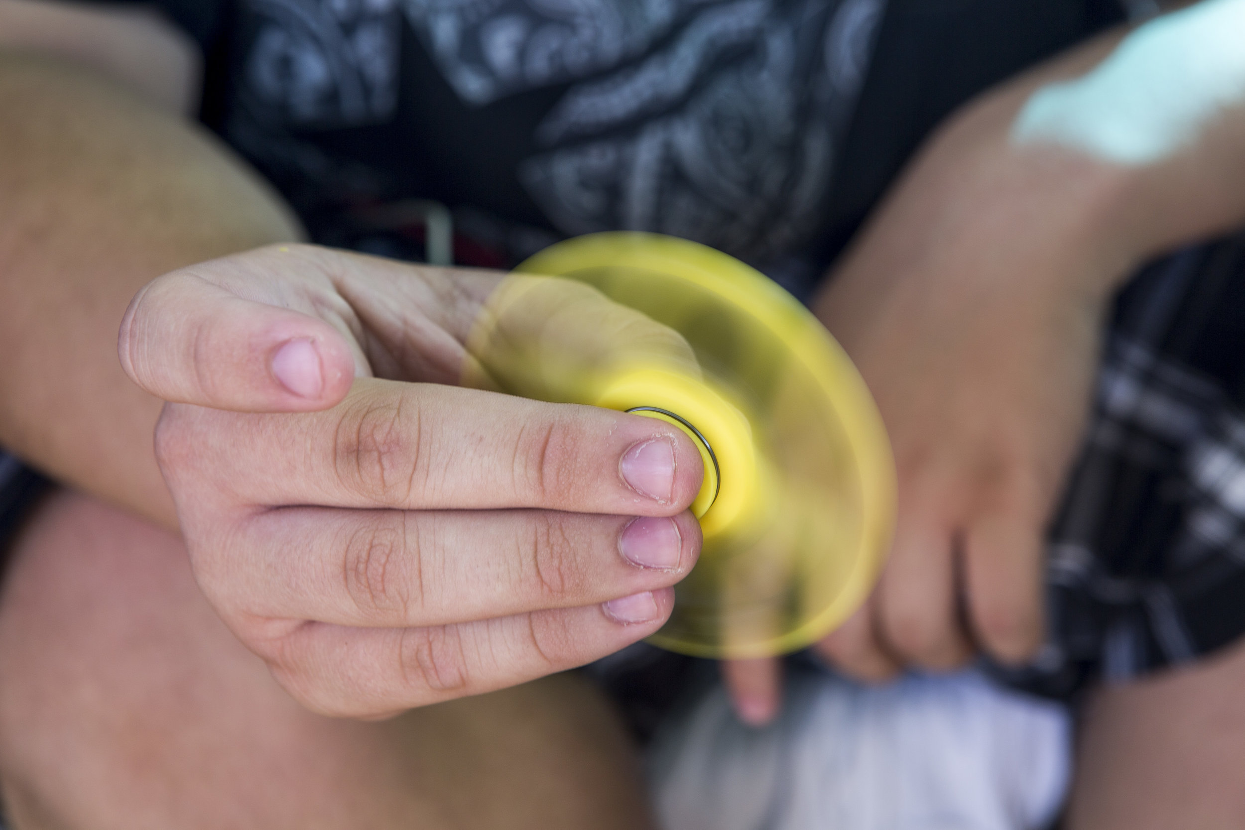  Anthony Murillo, 15, plays with his fidget spinner at Stephanie Lynn Craig Park in Henderson on Monday, May 22, 2017. Fidget spinners have been the source of scrutiny by some school teachers and officials, some of whom have banned the toys. Patrick 