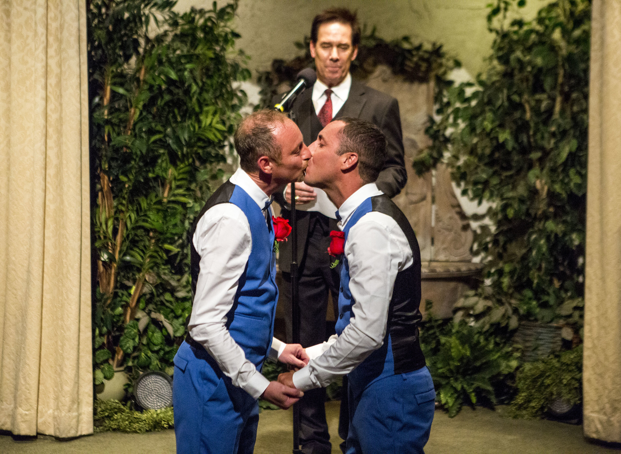  Lee McCulloch, right, and Stuart Dootson of Folkstone, England, kiss during their wedding at the Viva Las Vegas Wedding Chapel on Saturday, June 3, 2017.  Patrick Connolly Las Vegas Review-Journal @PConnPie 