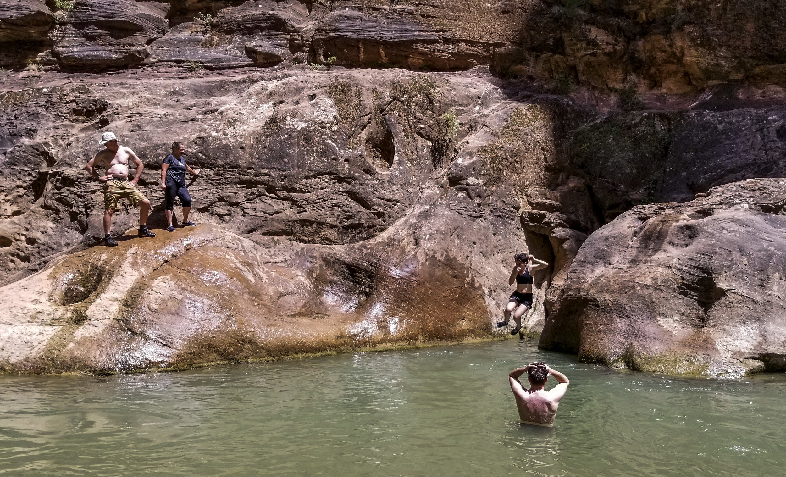  Zion National Park visitors jump off rocks along The Narrows, a river hike through the Virgin River, at Zion National Park in Utah on Friday, July 14, 2017.  Patrick Connolly Las Vegas Review-Journal @PConnPie 