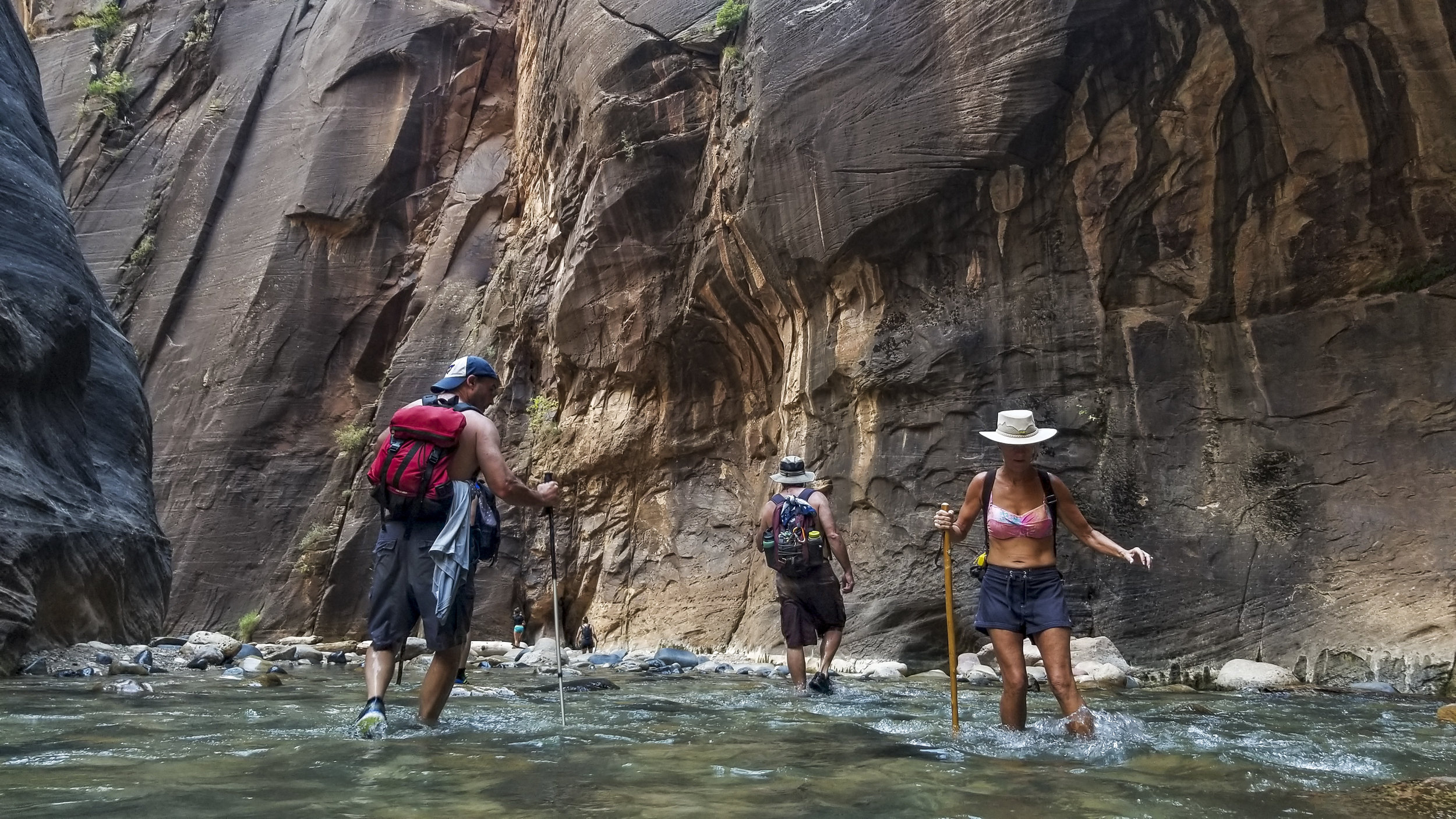  Zion National Park visitors walk along The Narrows, a river hike through the Virgin River, at Zion National Park in Utah on Friday, July 14, 2017.  Patrick Connolly Las Vegas Review-Journal @PConnPie 