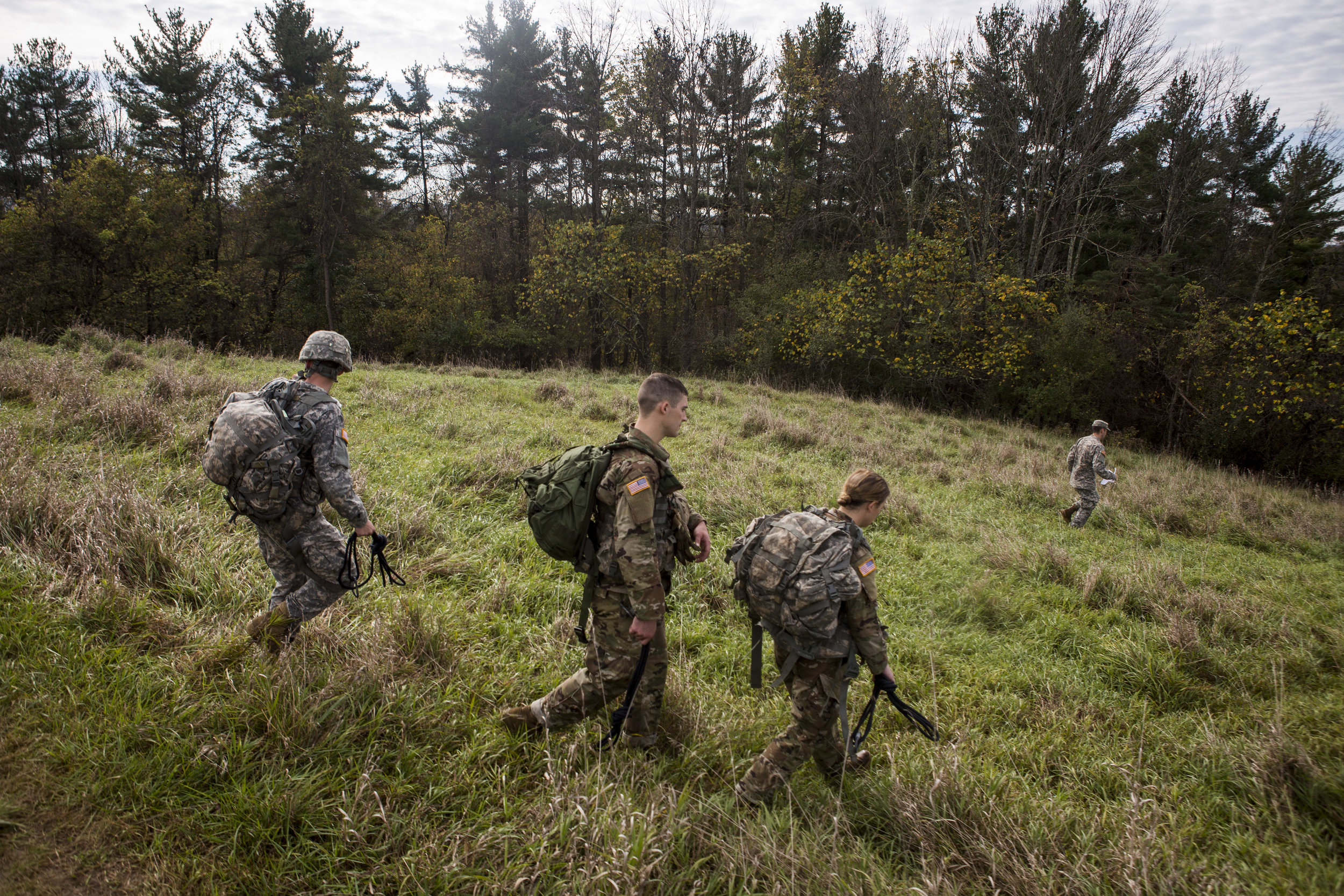  Simeon accompanies other ROTC cadets as they head toward the site of the rope bridge, a test of teamwork and technical skill. 