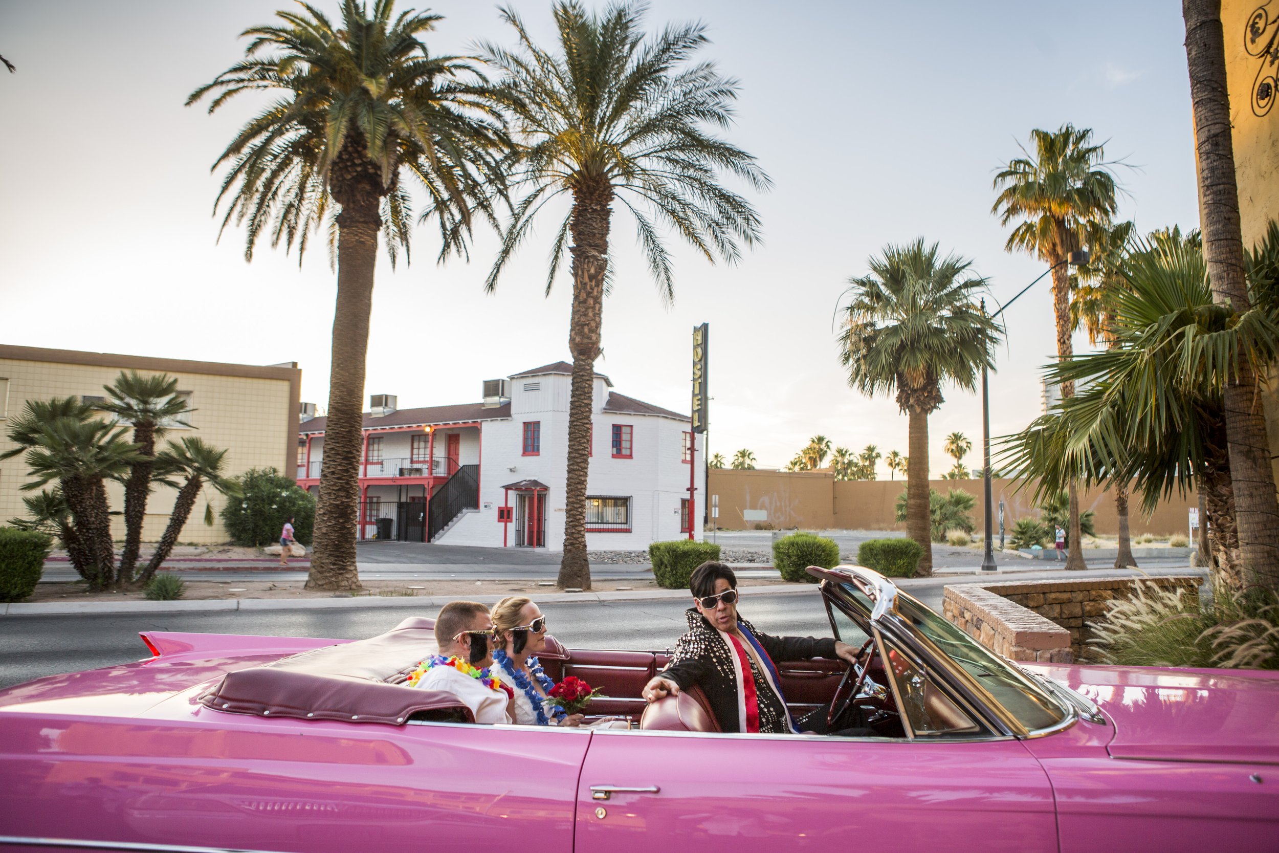  Ron Decar, owner of Viva Las Vegas and dressed as Elvis, drives Missie Berry and Robert Moseley into the chapel to renew their wedding vows at the Viva Las Vegas Wedding Chapel. 