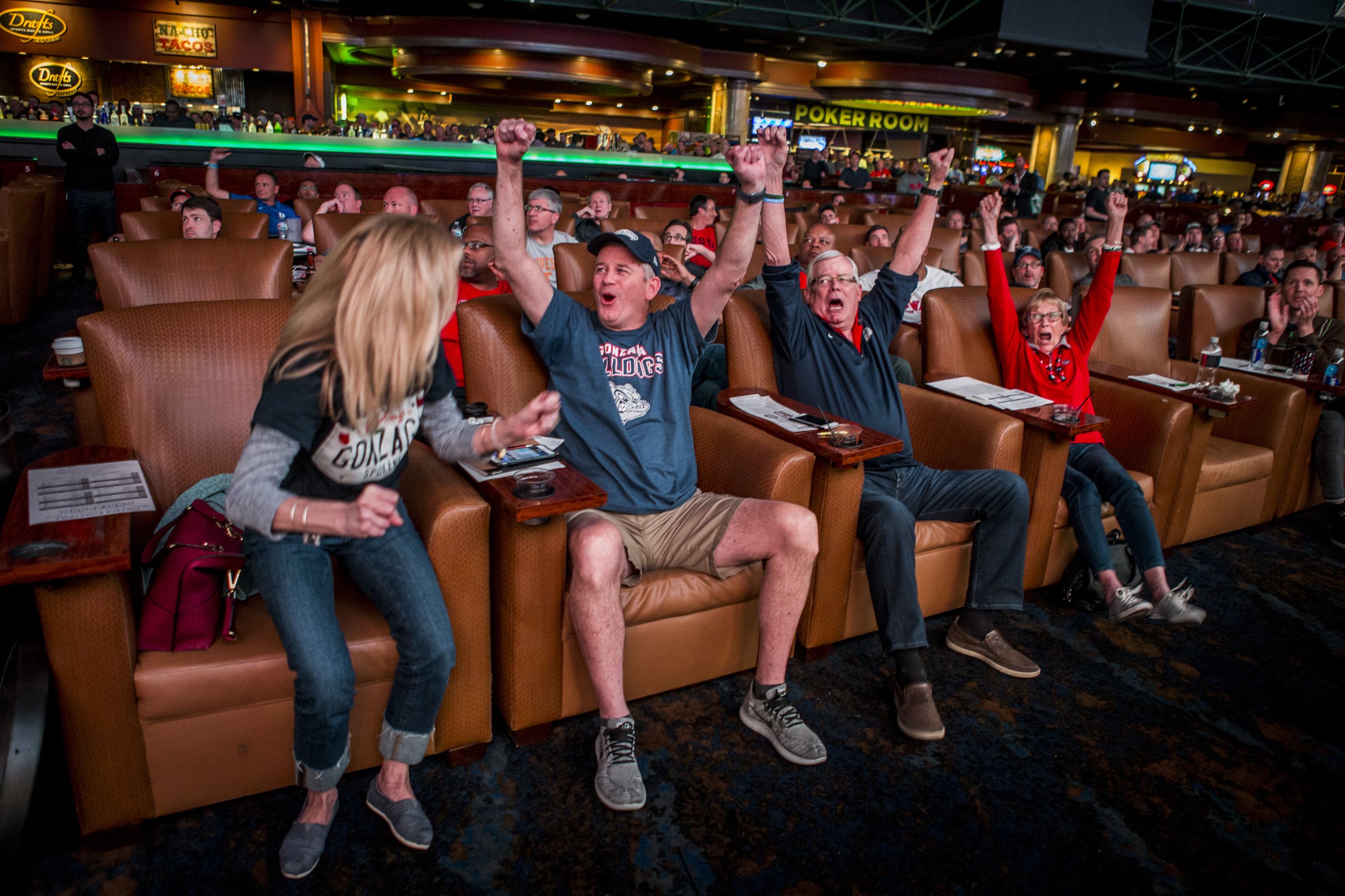  Fans celebrate during March Madness at the Superbook at Westgate in Las Vegas on Thursday, March 15. 