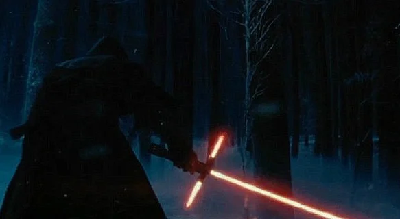 Something called Kylo Ren, wielding something that J.J. Abrams claims is a lightsaber (Image&nbsp;© Disney).&nbsp;