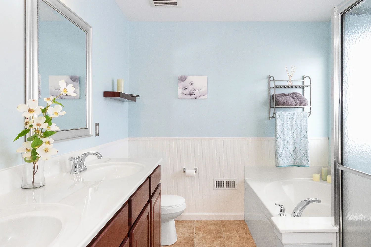 bathroom-with-soft-light-blue-walls-picture-baby-flowers-jason-lusk-portfolio.jpg