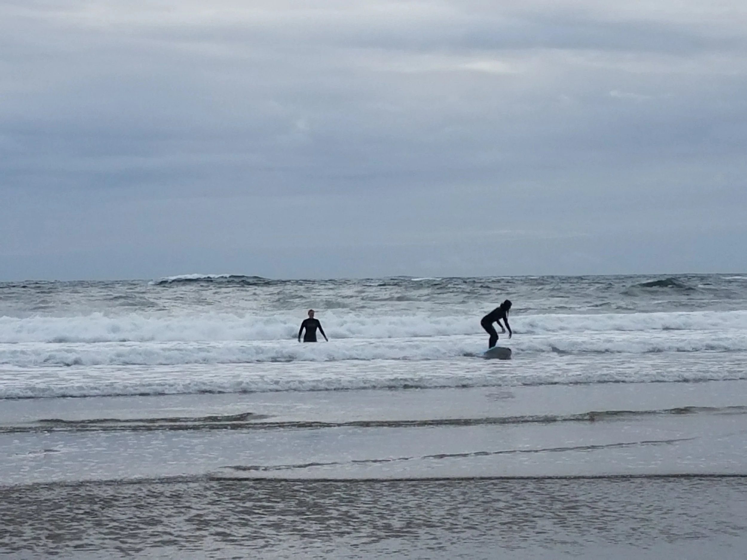 She can surf somewhat, me on the left on the other hand...