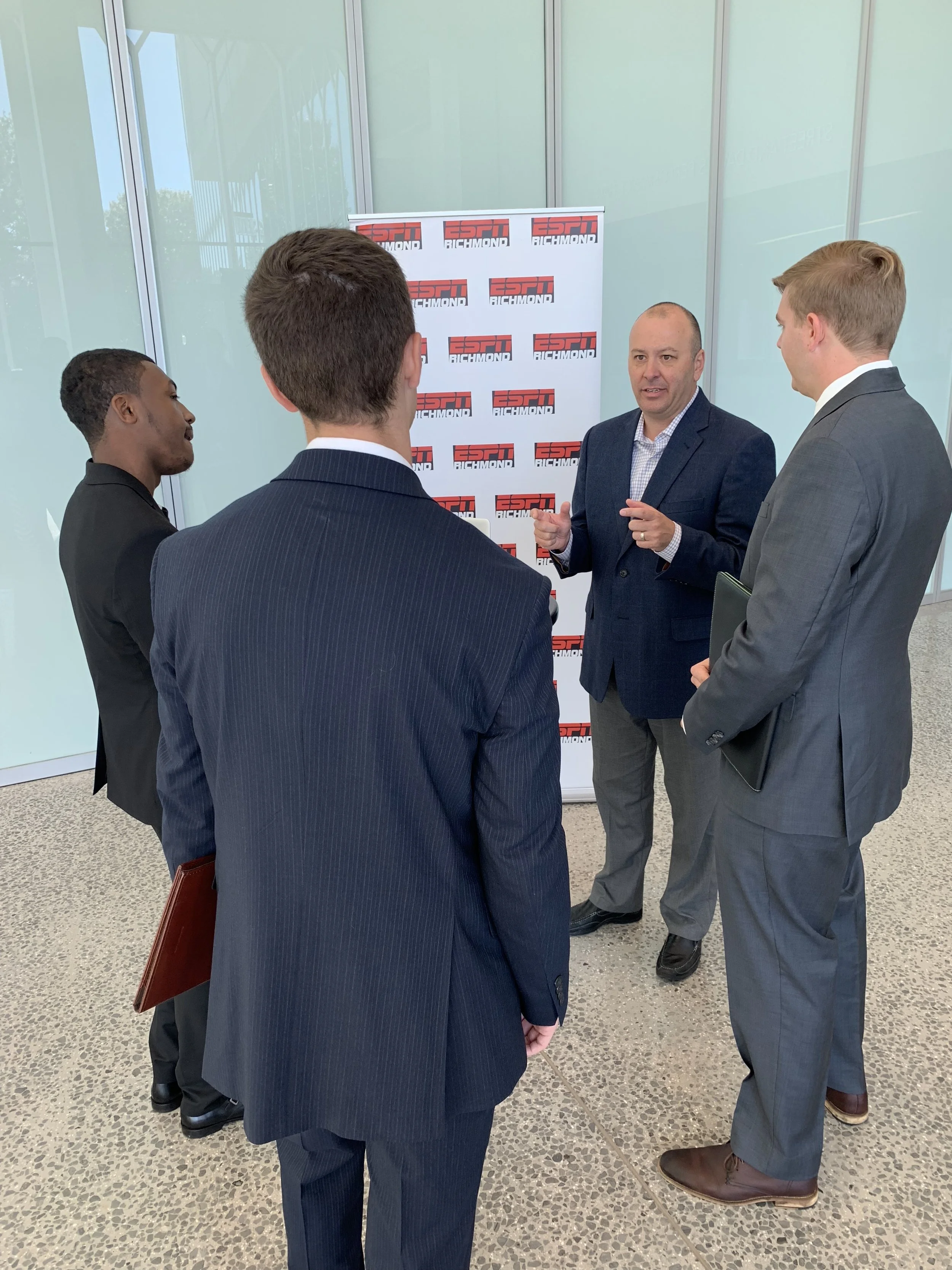 Greg Burton of ESPN Radio in Richmond, Virginia visits with Virginia Tech students at the Virginia Tech Communication Department 2018 Career Fair.