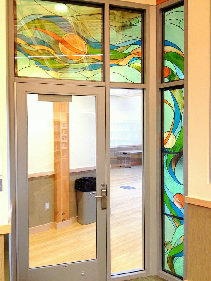 Stained glass installation by Polly Lee and Debi McMohan in the Petersburg Public Library