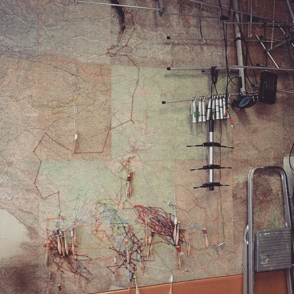 &quot;The back wall is taken up with a vast map of Slovenia, a stepladder propped beside it to better reach the north. The map is cobwebbed with threads and pins like a police incident board, each thread a different colour, and each bobbin of thread 