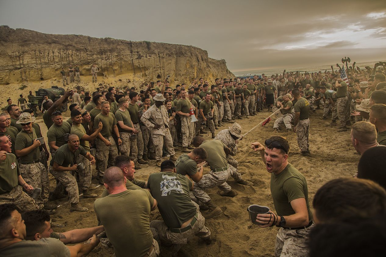1st Place in the Features category: U.S. marines with 1st Light Armored Reconnaissance Battalion, 1st Marine Division participate in a tug of war competition during warrior night at Marine Corps Base Camp Pendleton, Calif., July 1, 2015. Warrior night is an annual event held to build camaraderie in the battalion. IMAGE: LANCE CPL. RYAN P. KIERKEGAARD, USMC