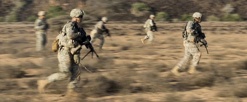 2nd place in the Combat Operations category: Soldiers from Alpha Company, 1st Armored Battalion, 77th Armored Regiment 3rd Armored Brigade Combat Team, 1st Armored Division, East Africa Response Force (EARF) bound to cover by section during a live fire training exercise at the Arta training range in Djibouti, May 30, 2015. The EARF is a quick reaction force designed to defend U.S. assets within the Combined Joint Task Force Horn of Africa area of responsibility. IMAGE: STAFF SGT. GREGORY BROOK, USA