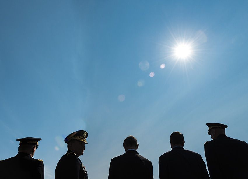 3rd Place in the News category: 38th Chief of Staff of the Army Gen. Raymond T. Odierno, Secretary of Defense Ashton B. Carter, Secretary of the Army John M. McHugh, 18th Chairman of the Joint Chiefs of Staff Gen. Martin E. Dempsey, and 39th Chief of Staff of the Army Mark A. Milley stand in line prior to the start of the United States Army Change of Responsibility ceremony held at Summerall Field in Fort Myer, Va., Aug. 14, 2015. Gen. Raymond T. Odierno relinquished command of the U.S. Army to Gen. Mark A. Milley during the ceremony hosted by Secretary of the Army John M. McHugh. IMAGE: STAFF SGT. SEAN K. HARP, USA