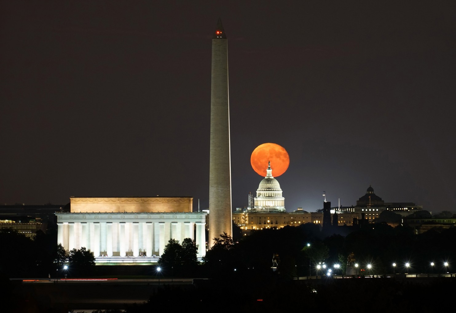 The Harvest Moon rises above Washington D.C., September 17, 2016. Photo credit: Kevin Ambrose