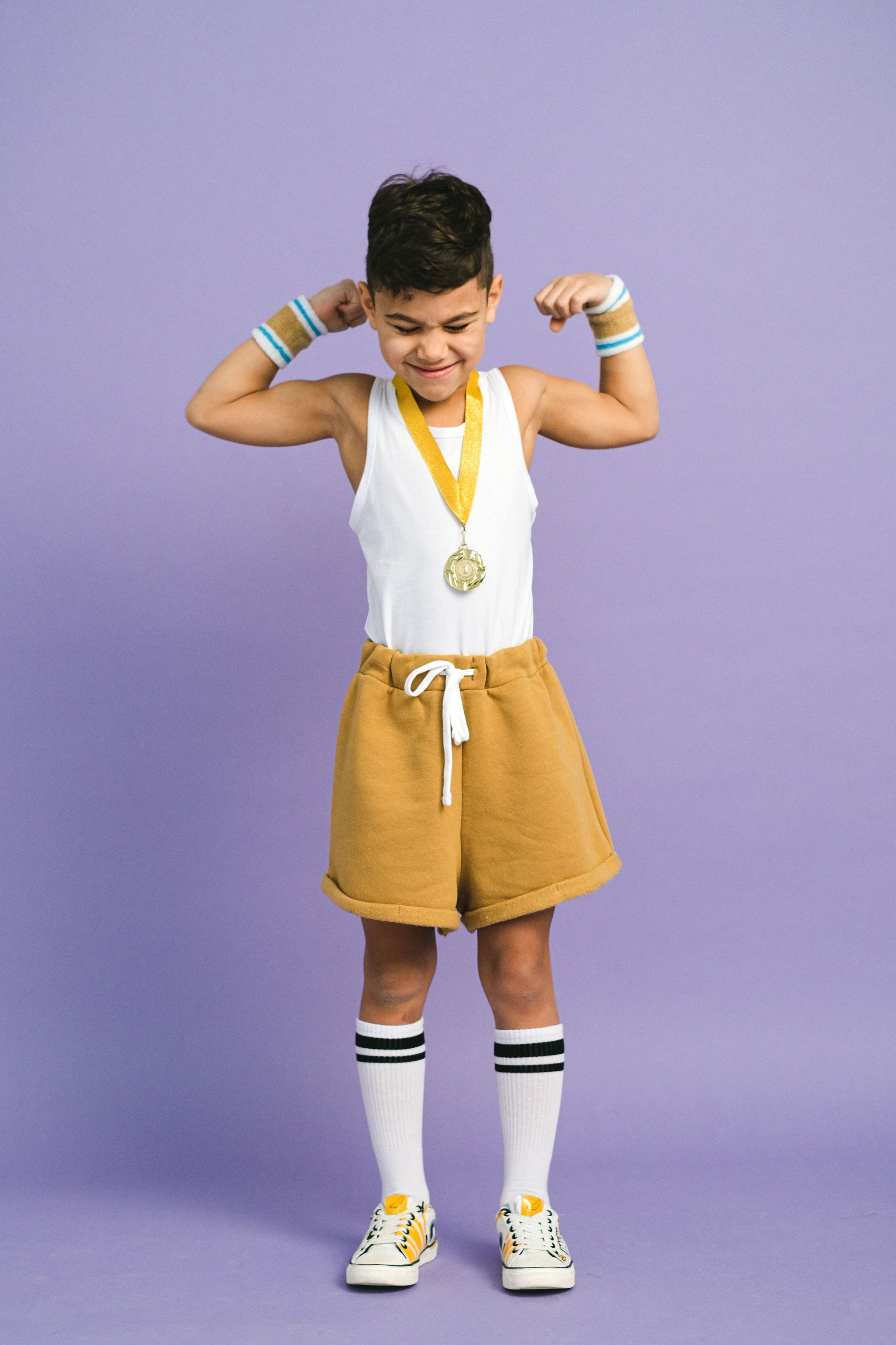 a boy celebrating a win