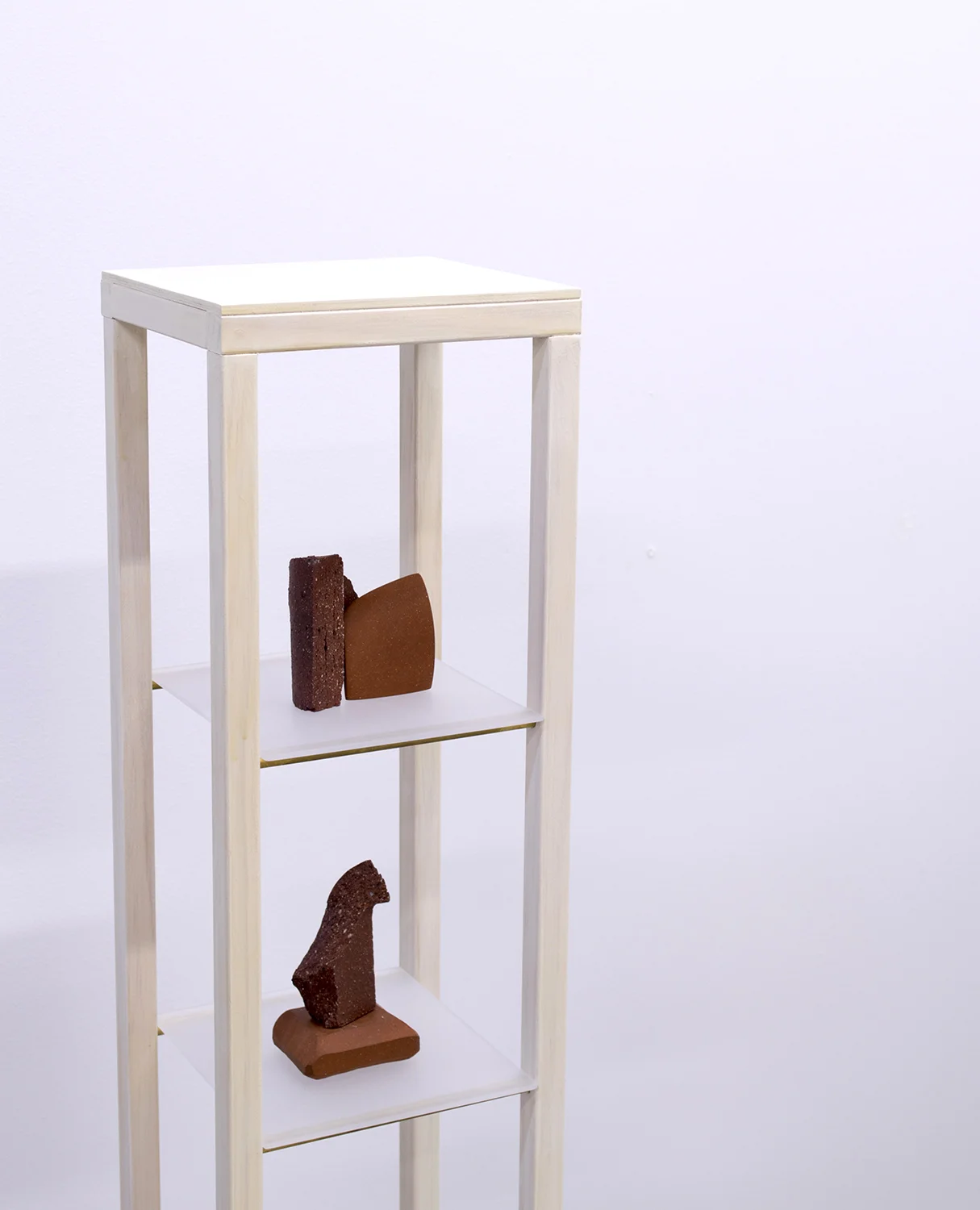 Just Beyond Tree Line, 2016 53 x 13 x 7 inches wood, granite, ceramic, brass rod, and plexi-glass