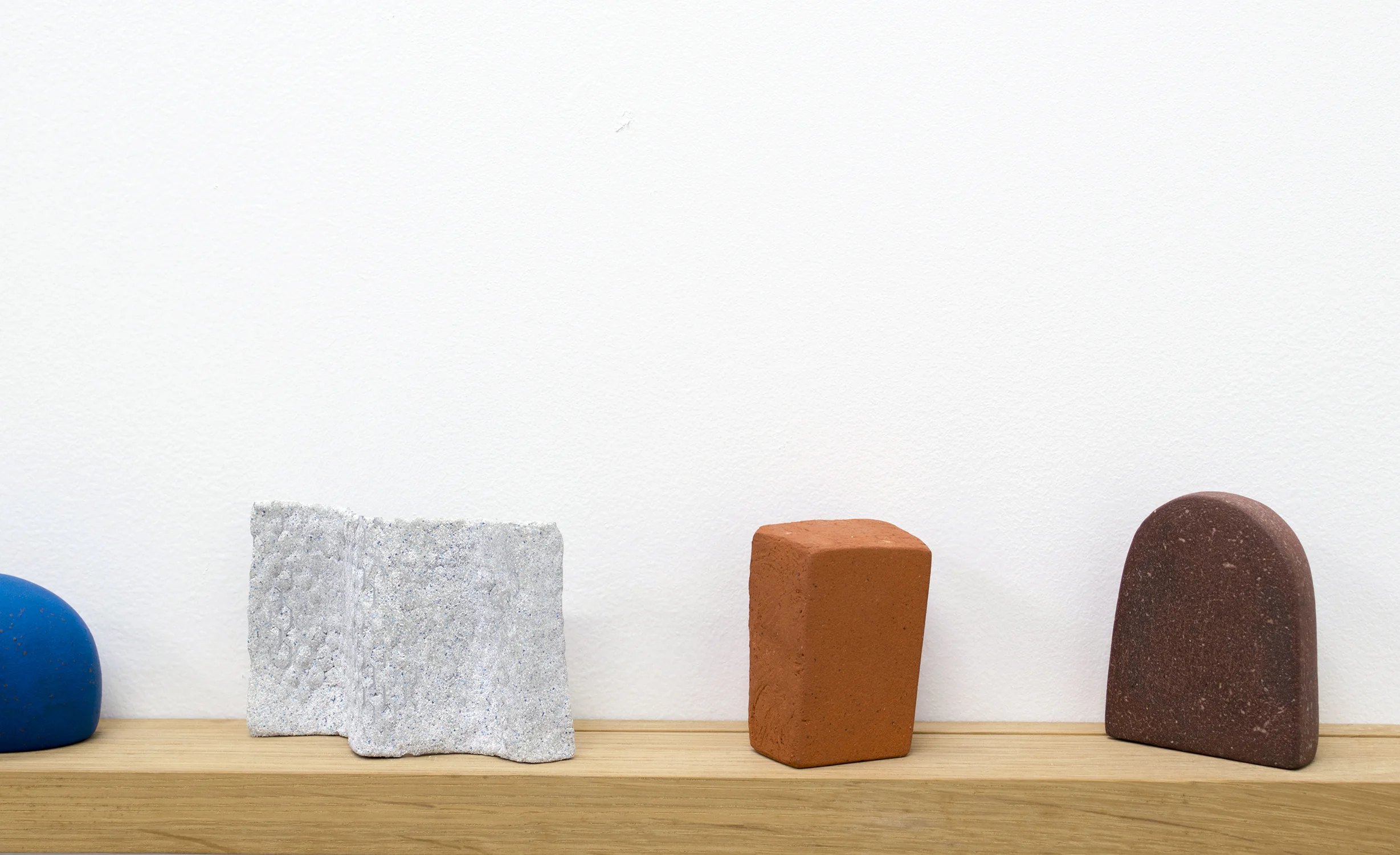 Three & Three, 2017 7 x 32 x 3 inches ceramic, wood, epoxy putty, sand, and gouache