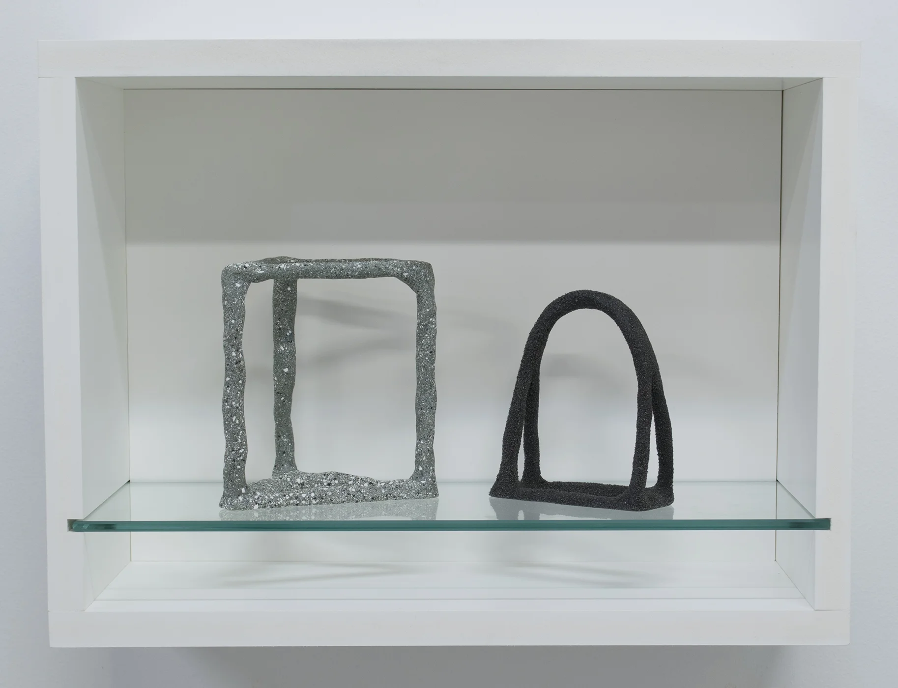 Wedge & Window, 2017 12 x 16 x 7 inches PVC board, sand, brass, epoxy putty, and glass