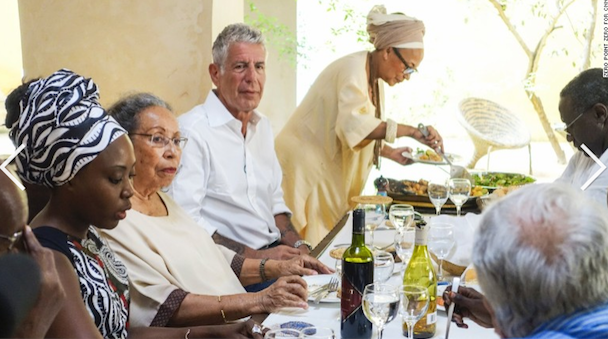 Bourdain with the same people I spent a wonderful weekend with in Saint-Louis, Senegal, at the same exact place I stayed at ten days ago, "Au Fil du Fleuve", in the wonderful care and hospitality of Marie-Caroline Camara (serving) and Amadou Diaw (across from Bourdain) as I strolled back and forth between his gorgeous home and Marie-Caroline's. Even bought couple of outfits from the uber talented fashion designer, Rama Diaw (with the black and white headscarf). Sweet memories...