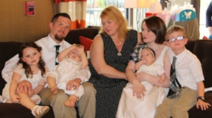 Welcoming Ciaran and Merida into the Muir clan. They are wearing baptismal outfits made from Jackie's wedding gown--which she wore when I married her and David a few years back too!