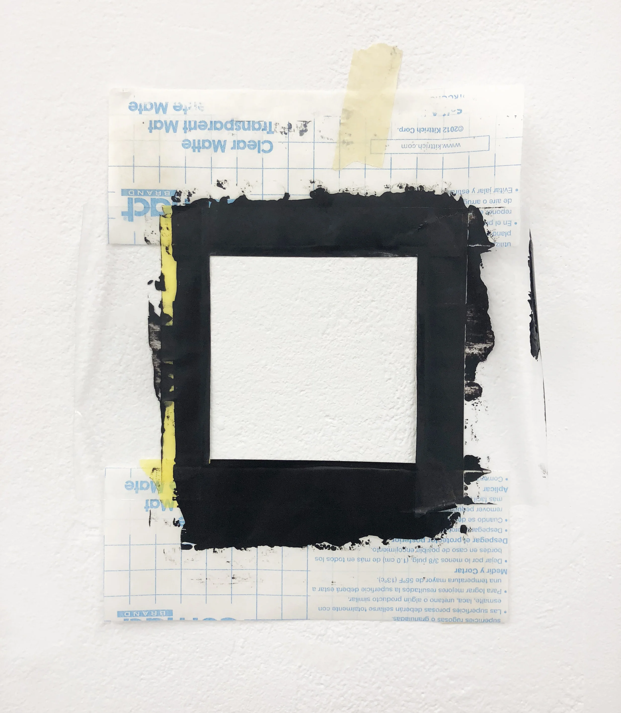 Null 11" x 9.5" Oil on contact sheets and tapes 2018