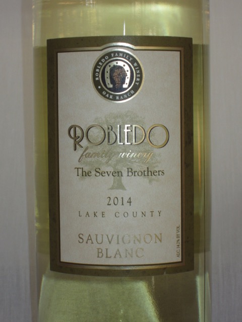 2014 Robledo Family Winery - The Seven Brothers Sauvignon Blanc ($7) This Sauvignon Blanc from Lake County is really nice. Thinking that this was so much better than a $7 bottle of wine, I headed out to the Robledo Family Winery website (www.robledofamilywinery.com) to investigate. Much to my surprise they are offering this bottle of 2014 Sauvignon Blanc for $22 ($15.40 for Club Members). It's a steal at $7. It's aged in Stainless Steel tanks for eight months which delivers bright aromas of honeysuckle and mango with citrus and lemongrass flavors. If you too are so lucky to find this wine, get more than a bottle. You'll enjoy it!