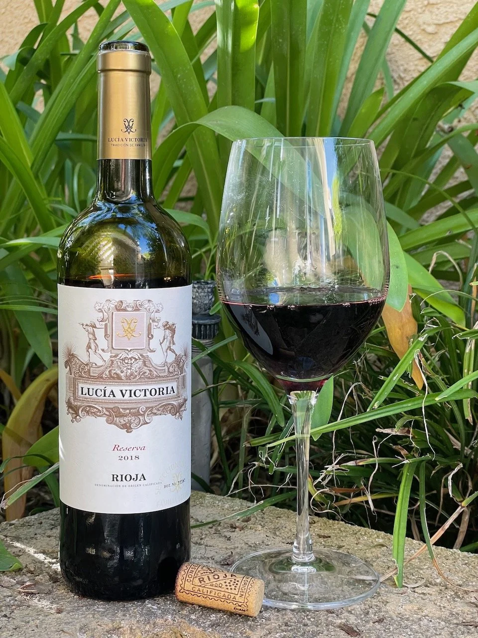   2018 Lucía Victoria Reserva Rioj   a ($8)    D.O. 5 Hispanobodegas is a group  of win eries which produces and distributes quality wines from the most emblematic Officially Certified Wine growing Regions of Spain: Rioja, Ribera del Duero and Rueda.