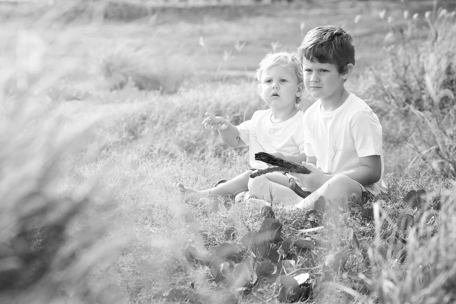 Black and white candid children playing at the beach at Shorncliff Stuart C Photography Caboolture Outdoor Portrait Photographer Caboolture outdoor family photographer, Caboolture outdoor family photography, Caboolture outdoor family photos, family photos Caboolture, family photographer Caboolture, family photography Caboolture, outdoor family photographer Caboolture, outdoor family photography Caboolture, outdoor family photos Caboolture, Caboolture photographer