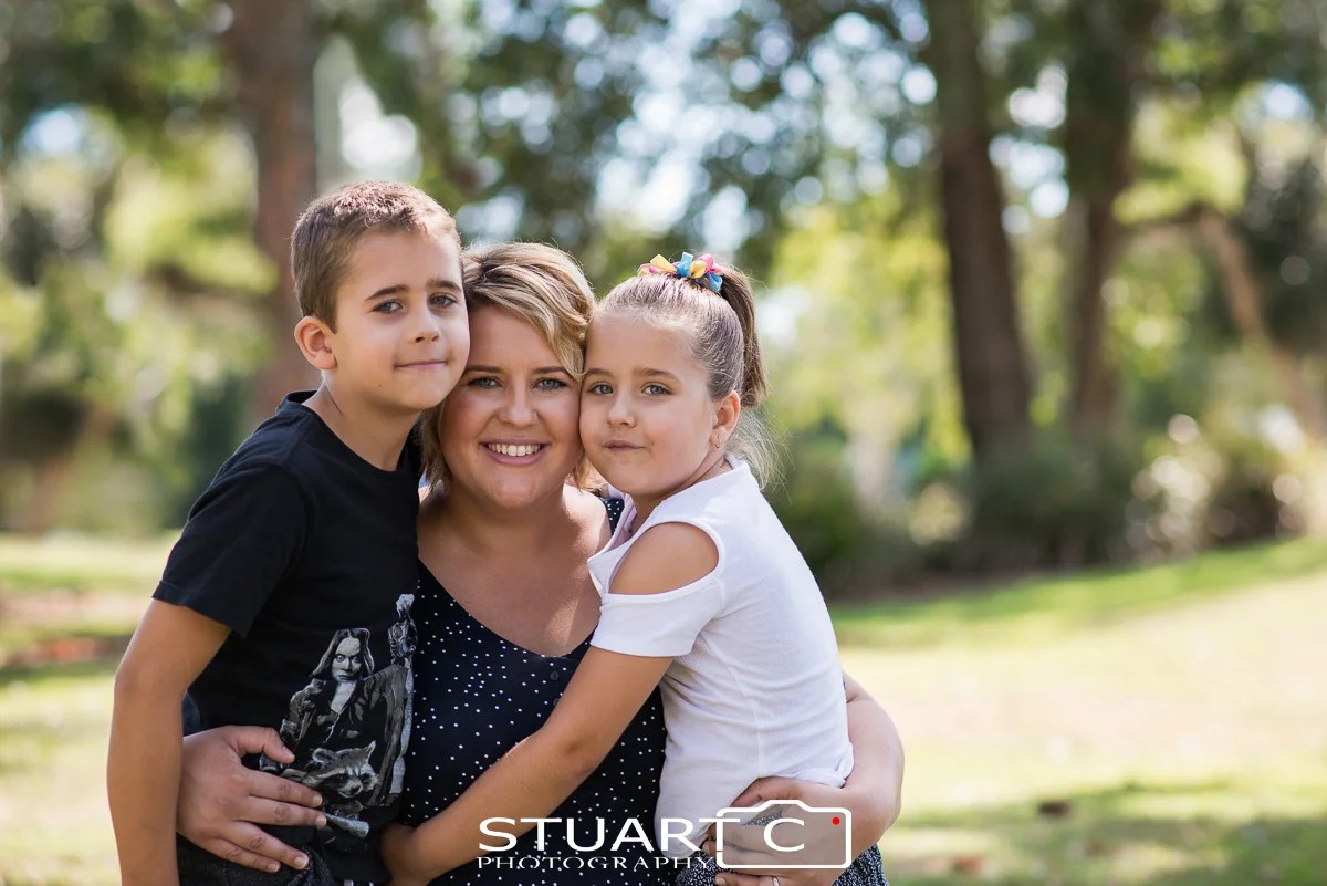 outdoor family portrait of Mum with kids in park off briggs avenue beachmere