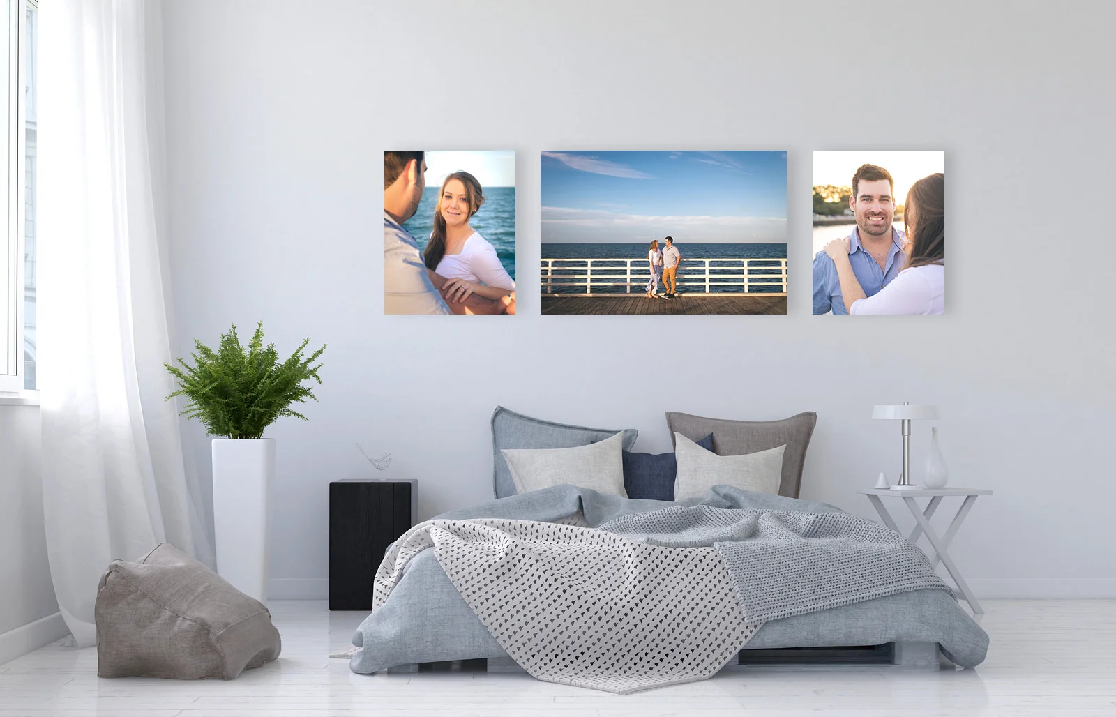 Trio of canvases on bedroom wall showing engagement photos