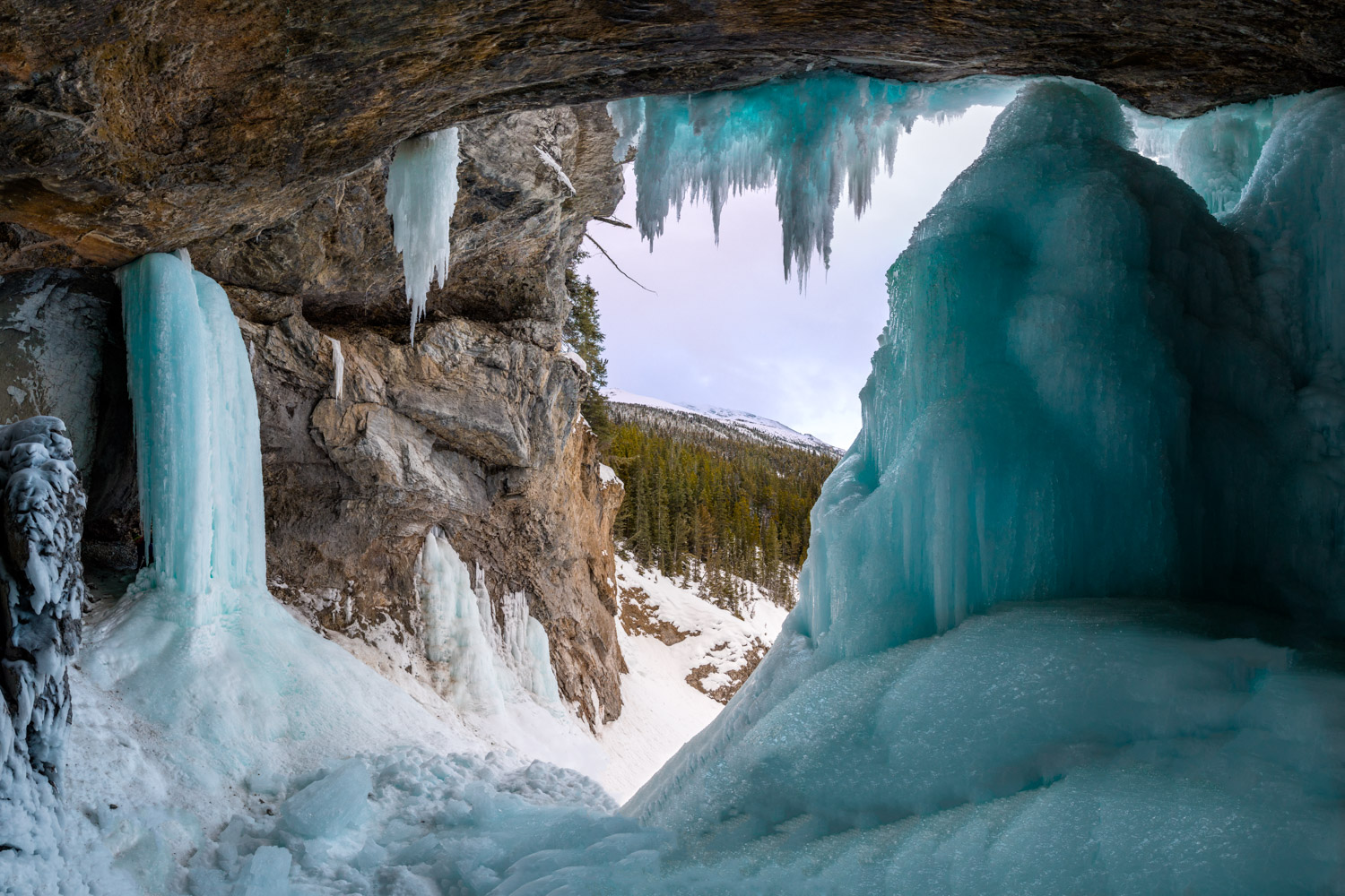 Behind the falls. We had to crawl across thick snow to get here.