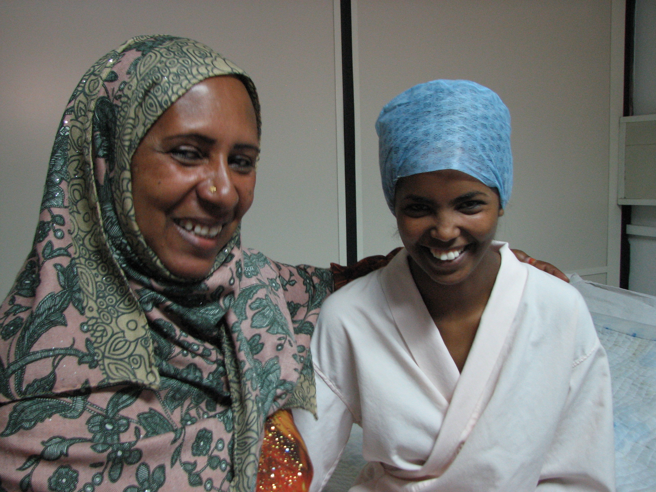 Aziza and her mother after her procedure