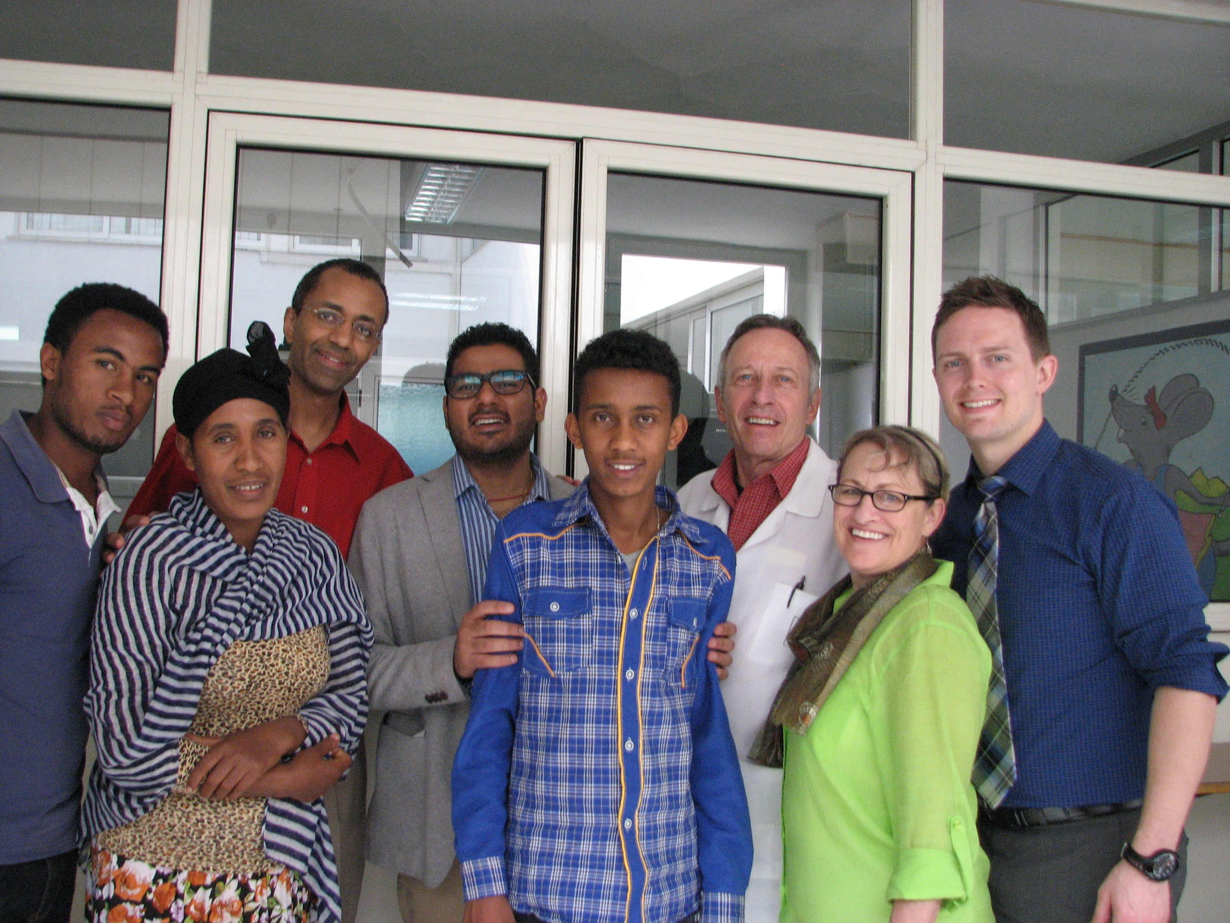 Abe with his mother, brother and the Cardiac team