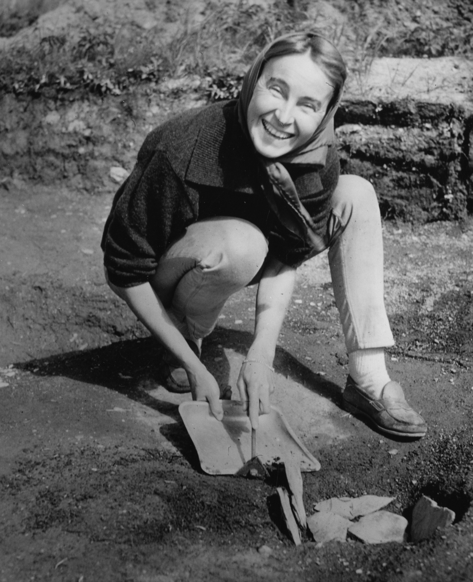 Norwegian archaeologist Anne Stine Ingstad at L'anse aux Meadows in 1963. A team of archaeologists led by Ingstad discovered the only confirmed Viking Age site in North America so far, L'anse aux Meadows. Image: Smithsonian Institute .