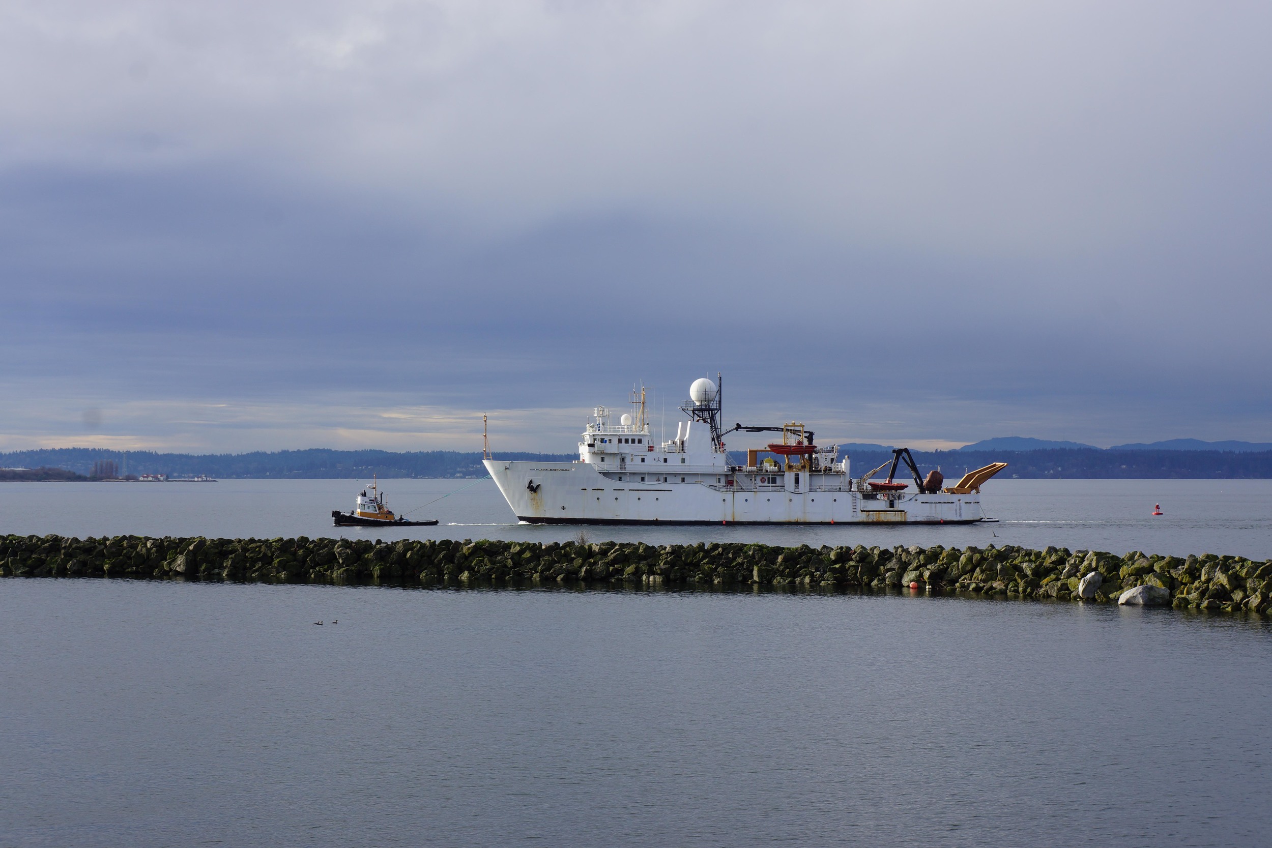 A little tug helps NOAA home. (12/15/2014)