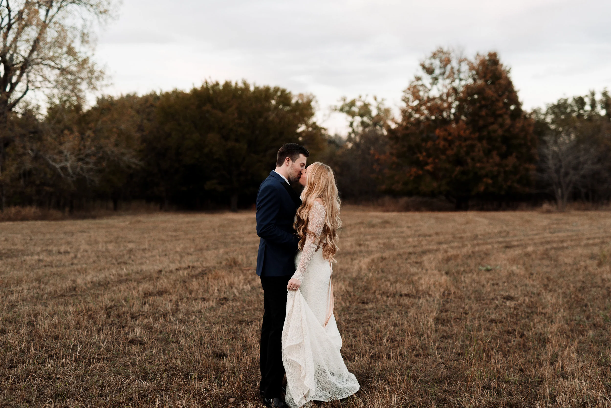 An encore session was one of the most fun times I've ever had in front of a camera! We had just gotten back from our honeymoon, more in love than ever and we got to document that! It also gave me the chance to wear my makeup and hair a little different! Kelcy was absolutely amazing! She gave direction, was outgoing, personable, and very patient and we quickly became friends! I would recommend an encore session to every bride getting married! - Madison Magill