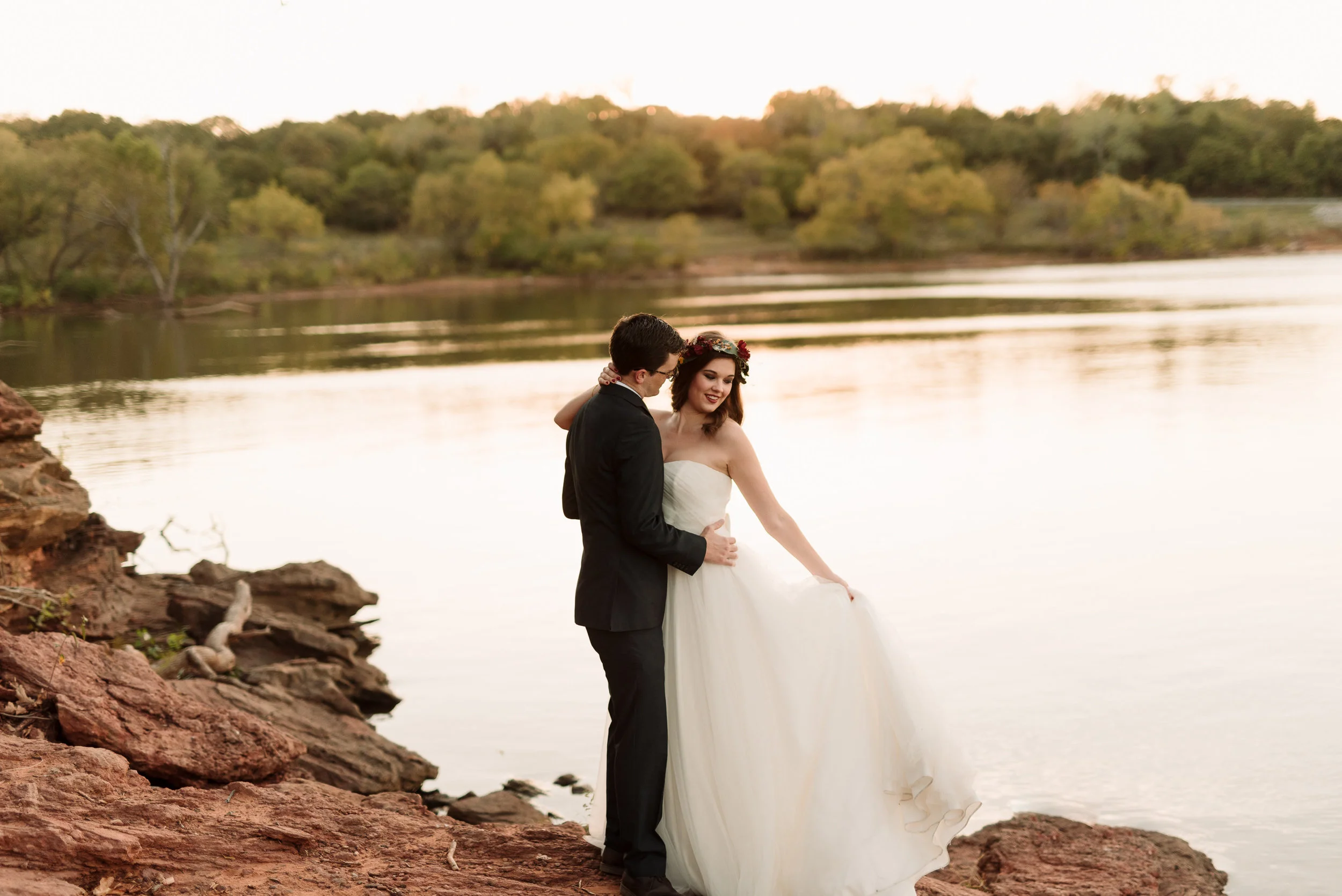 My husband, Kaleb, and I got married in May of 2014. One day, I was cleaning out my closet and came across my wedding dress. I remember thinking how bummed I was that I would never get to wear it again, and thinking how cool it would be to have some modern pics in my dress. That's when my fabulous friend, Kelcy Enriquez, asked if I would get back in my dress for an encore session. Duh!! What girl wouldn't love another chance to wear her wedding dress? Our encore session was completely different than the pics we took at our wedding. We had a different style, different location, and even different lighting. It was such a lovely experience reliving our big day. I recommend it to all married couples! -Megan King