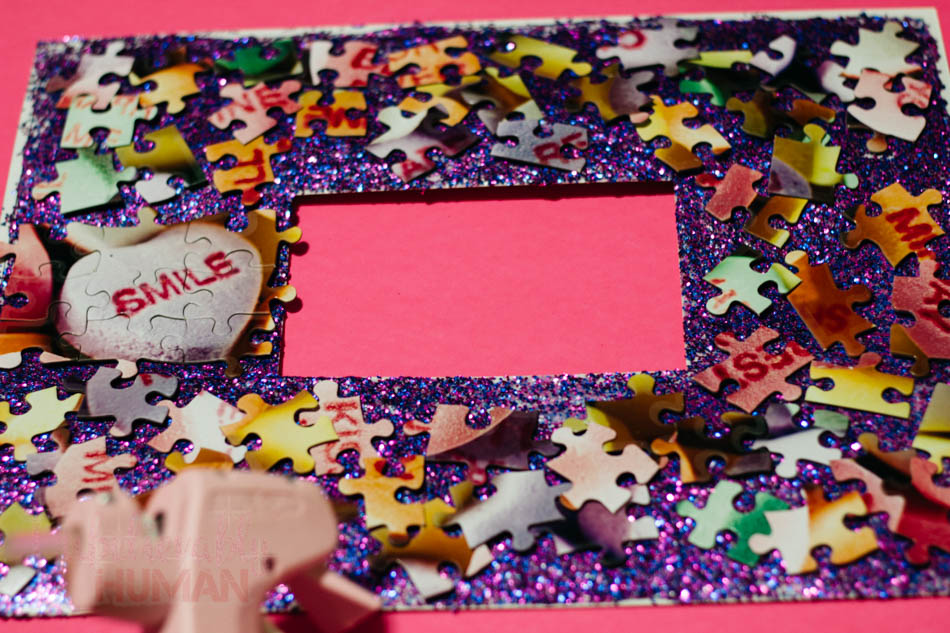 Hot Glue all the pieces to the photoboard.