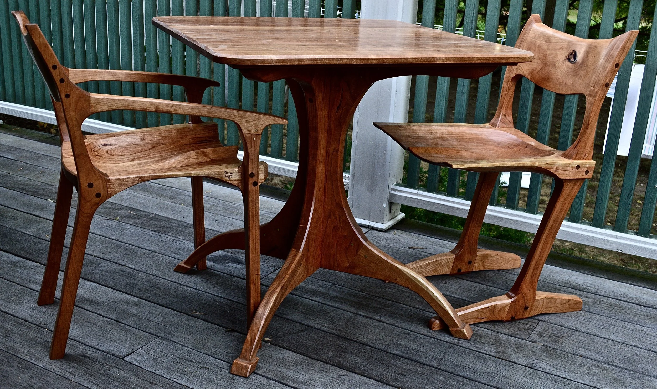 a Sam Maloof (low back occasional chair)- George Nakashima (conoid chair) mash in cherry w/ the cherry pedestal table