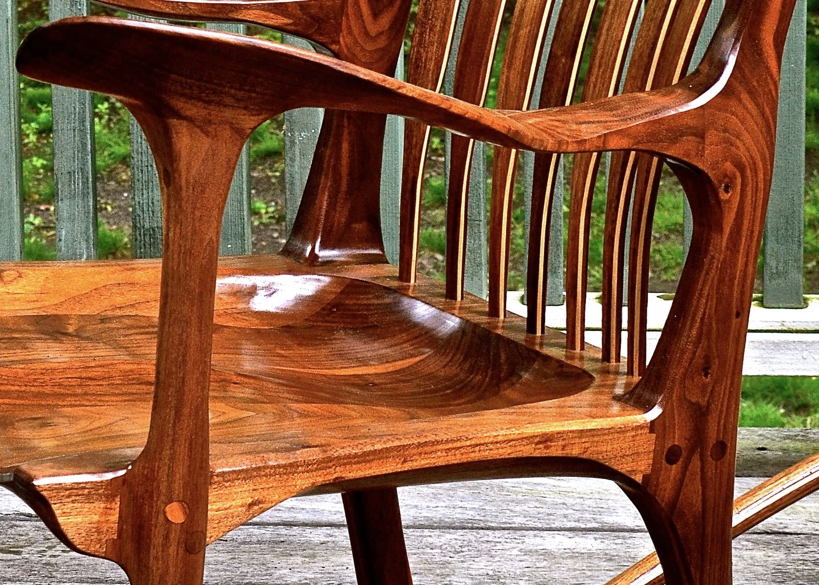 when finished, this joint is exposed and yet disappears, curving gracefully into the seat surface. also of note in this picture is the lines that carry from the legs into the arm.