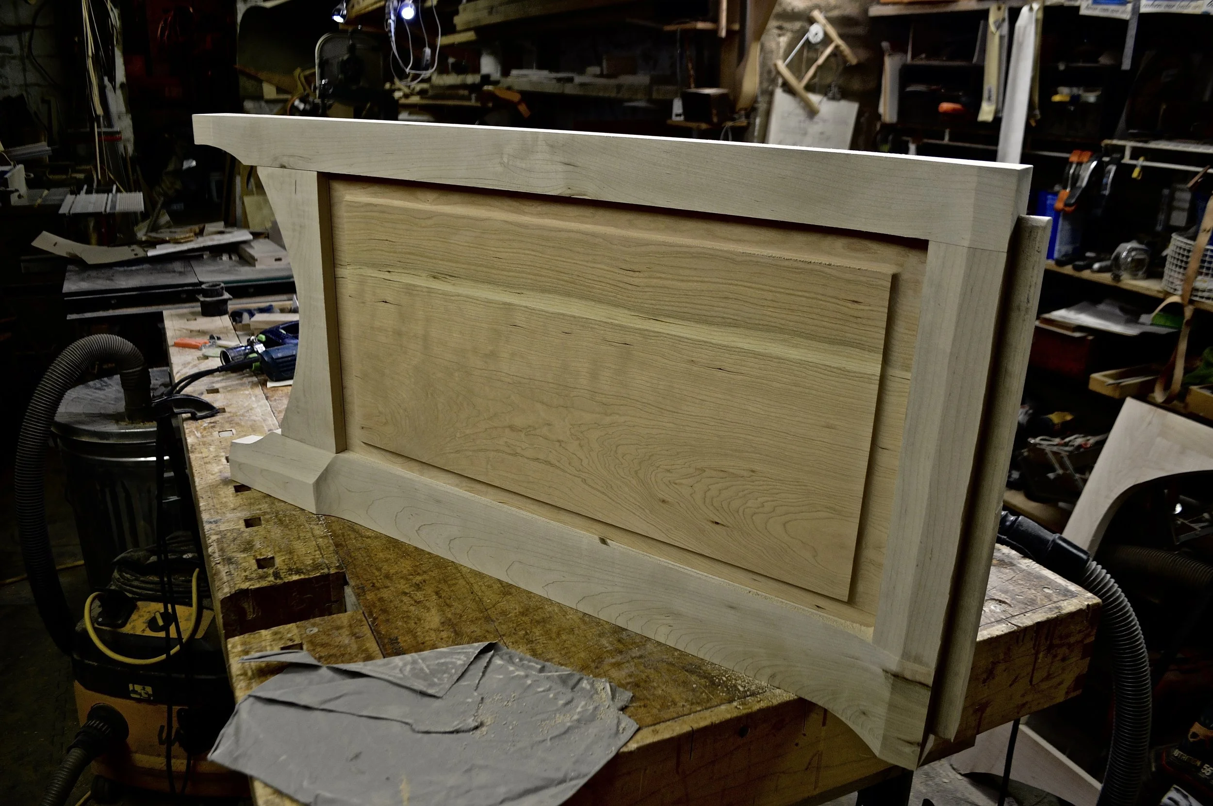 left end assembled with raised cherry panel male sliding dovetail for top on right