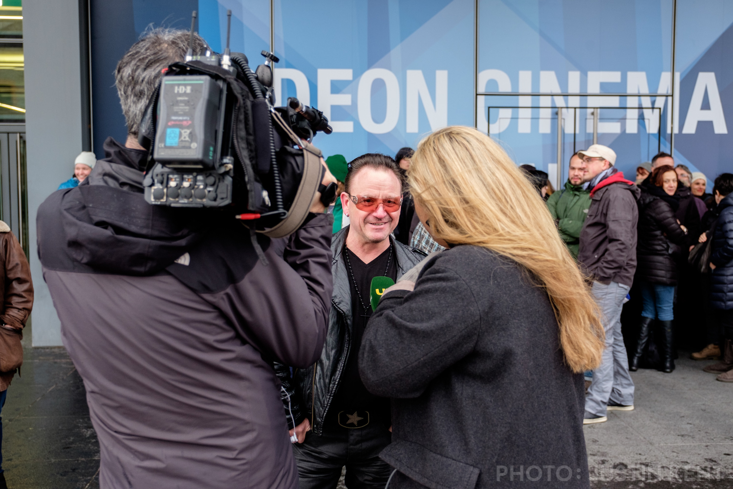 Local news interviewing Bono impersonator