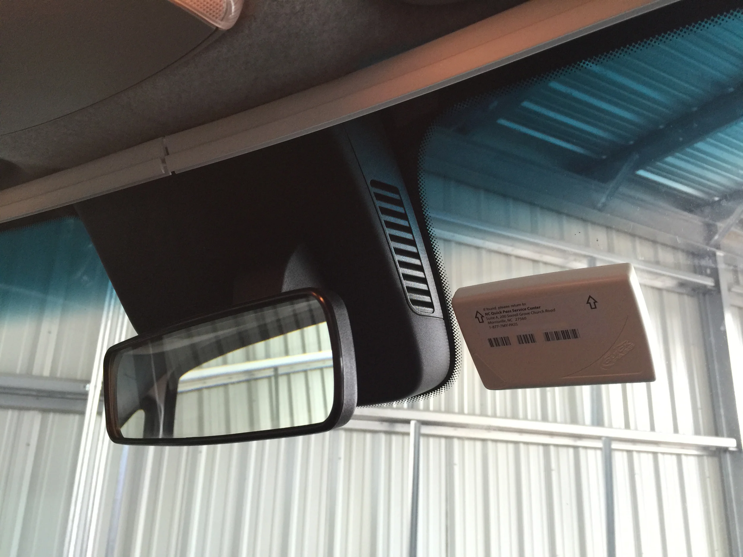 The NC Quick Pass transponder mounted on our windshield