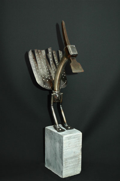 "Toolbird" Gereedschapsdelen op een hardstenen voet. afm.24 x 37 x 80 cm.