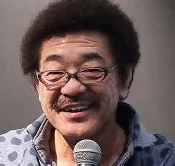Punch Perm - This is Gushiken Yoko, my favorite 1970s world champion boxer turned 2010s variety quiz show regular, sporting the not very popular Punch Perm.