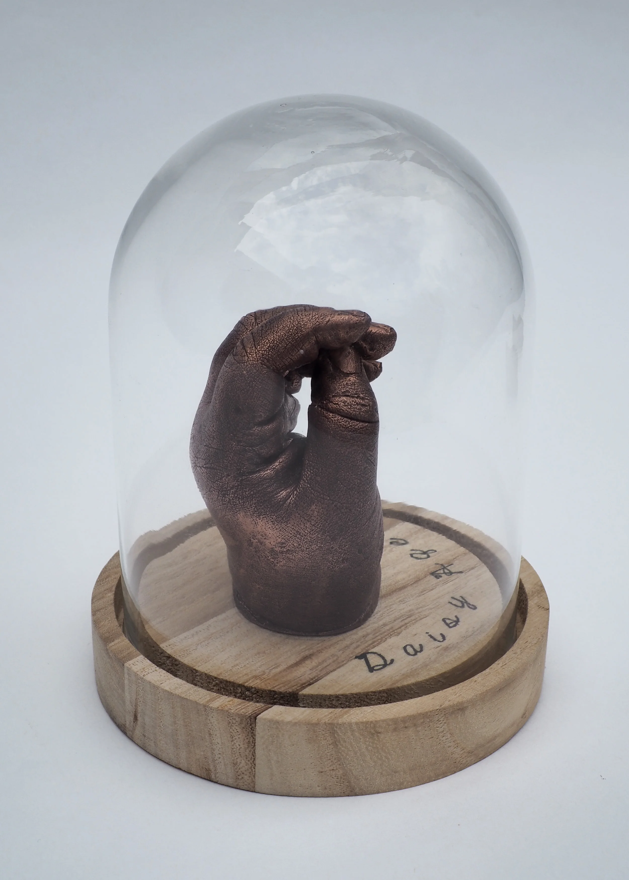 PAINTED HAND CAST IN BELL JAR