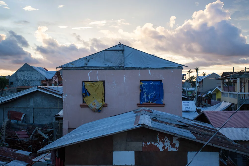  Families sought shelter in the second level of the Astorga’s home during the typhoon as waves engulfed houses in San Jose.&nbsp;More than 2 million people were left without&nbsp;adequate housing, according to the International Organization for Migra