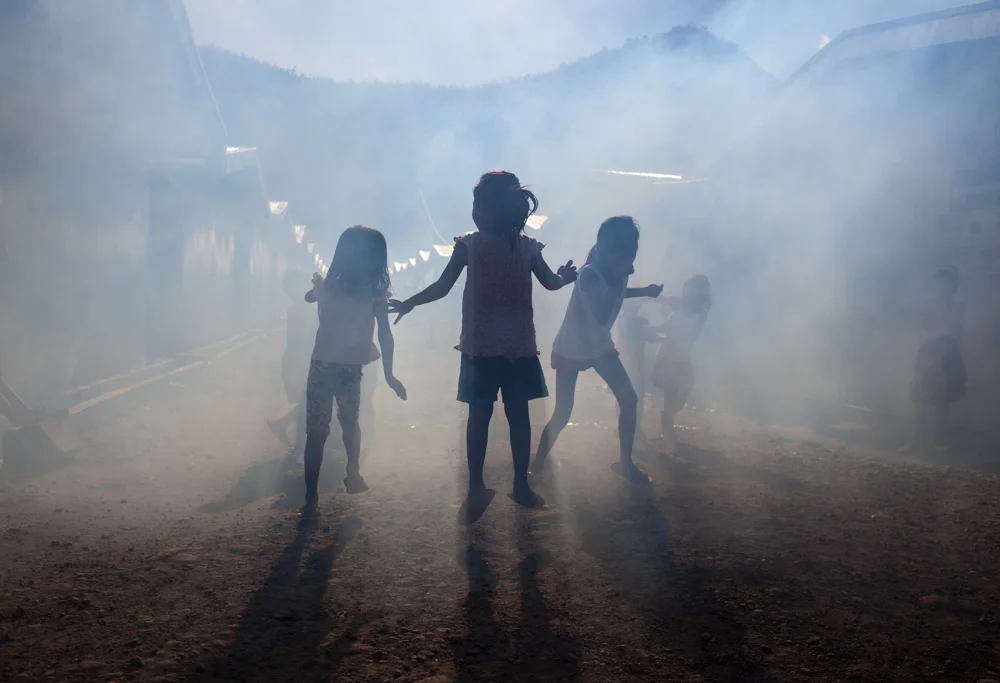   Children laughed and played in a&nbsp;suffocating fog of mosquito repellent.&nbsp;Soldiers from South Korea visited the&nbsp;shelter site where hundreds of people displaced by Typhoon Haiyan were moved for temporary shelter.&nbsp;The soldiers spray