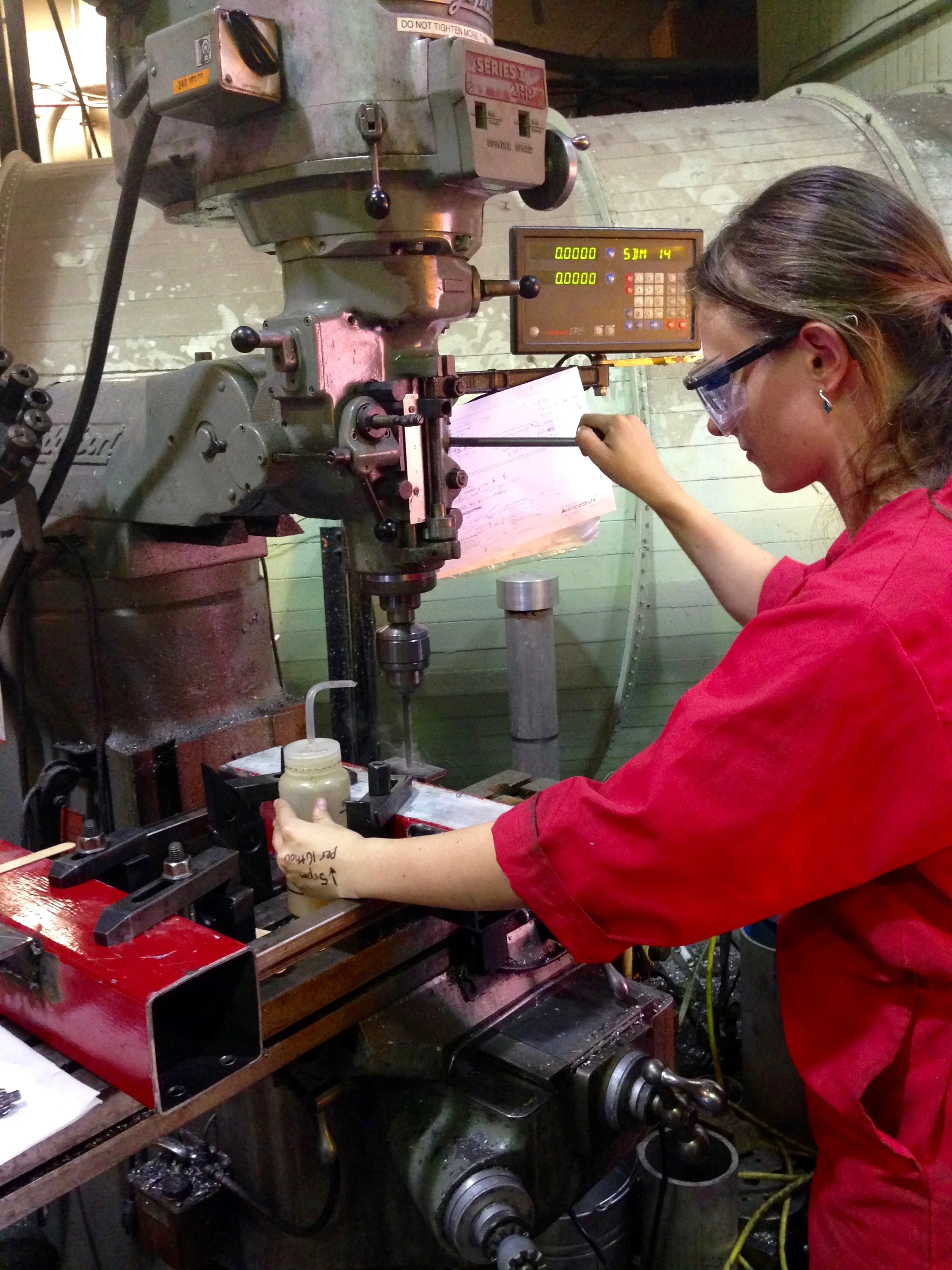 Skye Mceowen machining the avionics unit structure on the mill